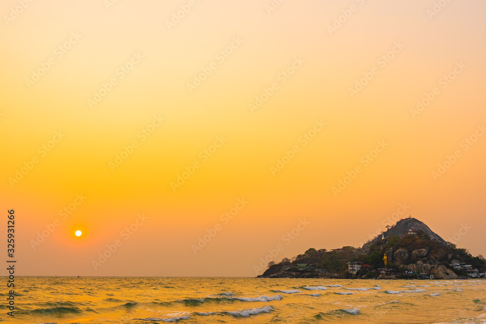 Beautiful tropical nature of sea beach ocean at sunset or sunrise time