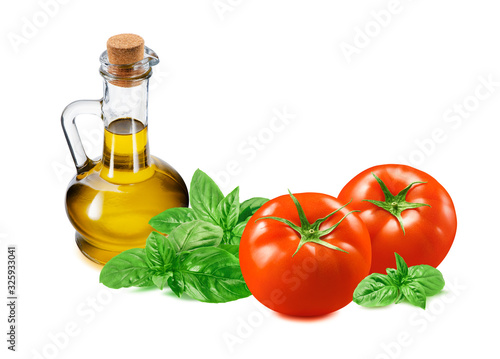 Fresh pesto ingredients, tomato, green basil and olive oil in bottle isolated on white background