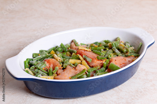 Green beans and chicken in a baking dish