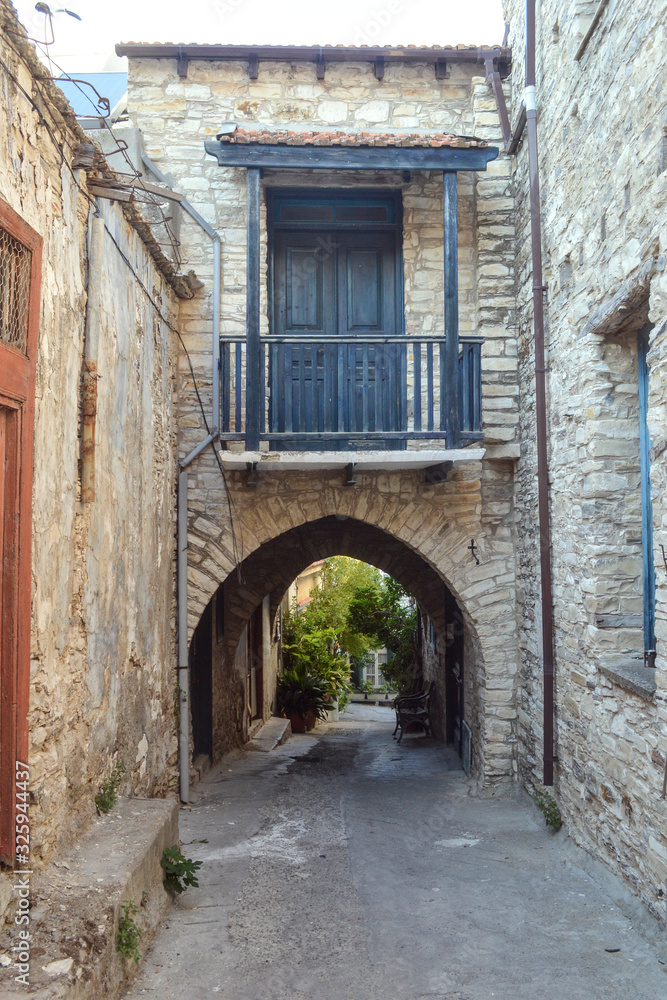 Fototapeta premium Old stone street in a Cypriot village.