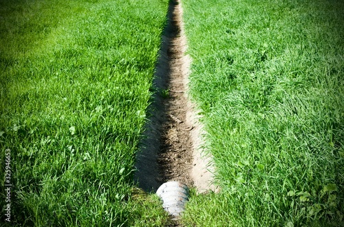 Drainage ditch interruption