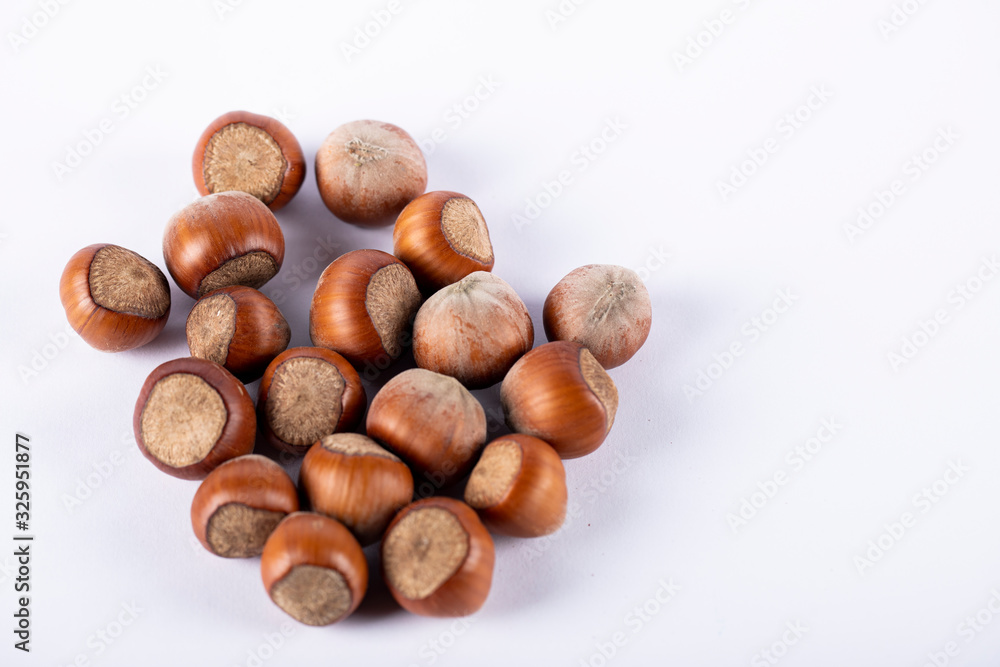 Nuts isolated on white background on the left side Nuts isolated on white background on the left side