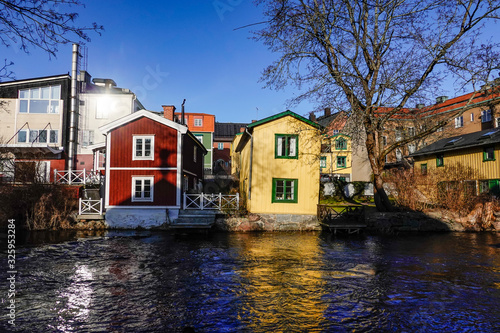 Norrtalje, Sweden Picturesque houses along the Norrtalje River. photo