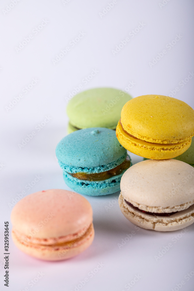Random selection of colorful macarons isolated on white Random selection of colorful macarons isolated on white