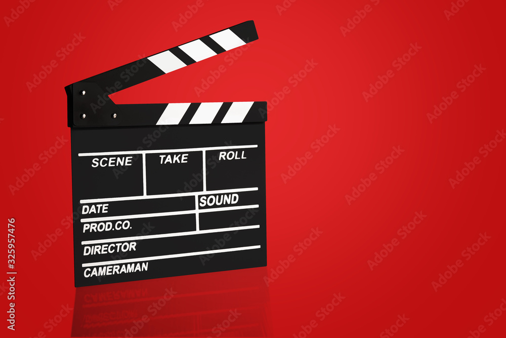 Blank Film clapper board or movie clapper cinema board , Slate film on red background .cinema concept clipping path included.