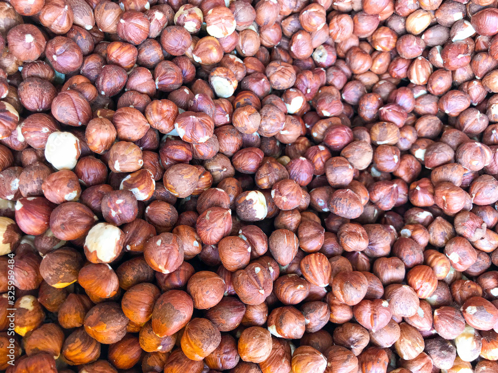Close-Up Of Peeled Hazelnuts. Healthy Fresh Food Background. Close-Up Of Peeled Hazelnuts. Healthy Fresh Food Background.