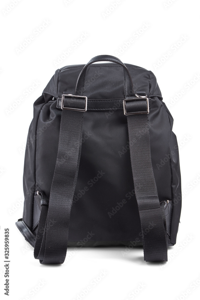 Modern designer backpack made of black textile, isolated on a white background. Rear view. Modern designer backpack made of black textile, isolated on a white background. Rear view.
