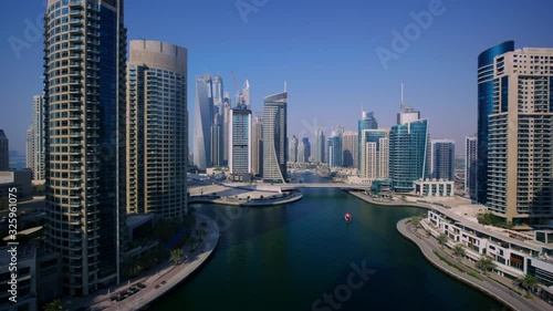 Popular famous urban skyscraper architecture of Dubai downtown cityscape in stunning 4k aerial drone panorama flyover