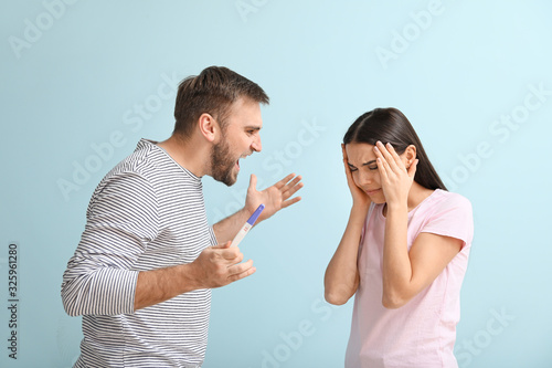 Emotional young couple with...