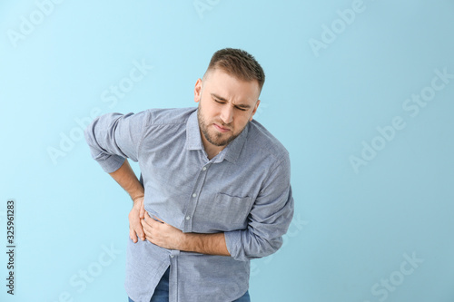 Young man suffering from ab...