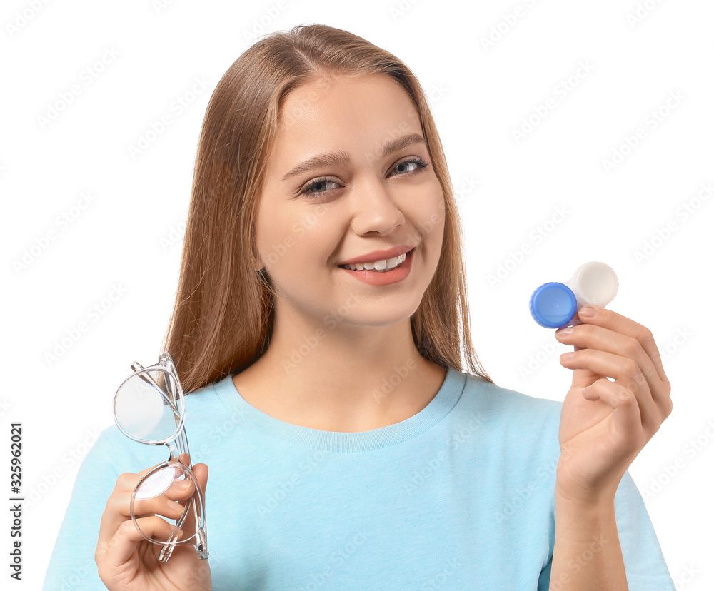 Young woman with contact lens case and eyeglasses on white background Young woman with contact lens case and eyeglasses on white background