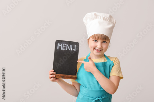 Cute little chef with menu ...