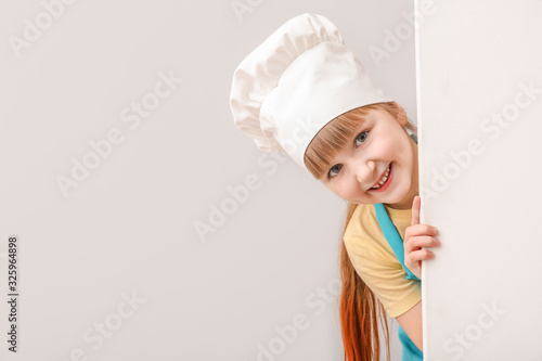 Cute little chef with blank...