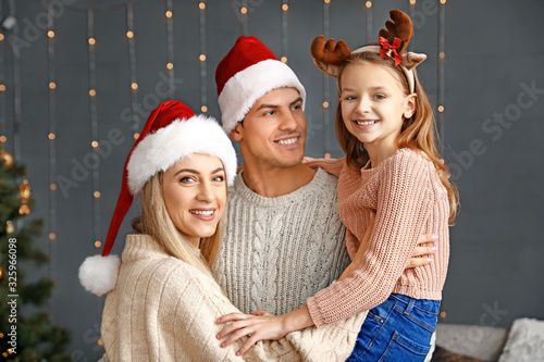 Happy family on Christmas e...