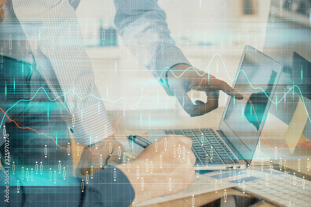 Double exposure of graph with man typing on computer in office on background. Concept of hard work. Closeup. Double exposure of graph with man typing on computer in office on background. Concept of hard work. Closeup.