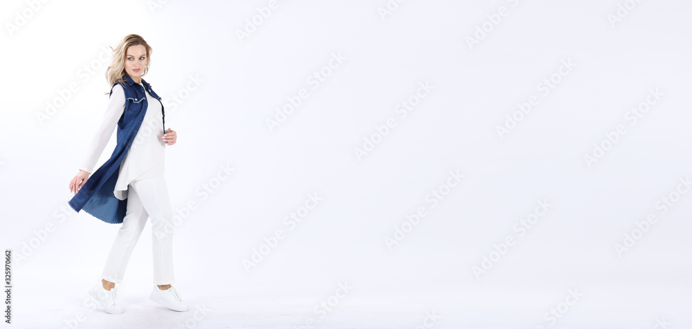 A Model Is Walking On A White Background A Model Is Walking On A White Background