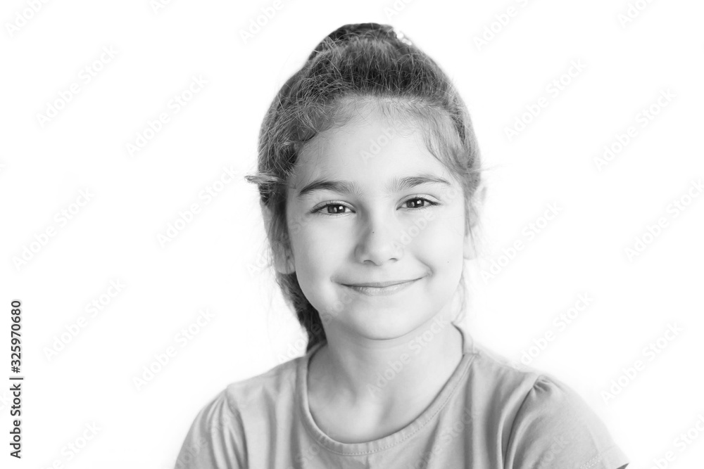 Portrait of happy laughing child girl. Smiling kid. Positive emotions. Black and white image Portrait of happy laughing child girl. Smiling kid. Positive emotions. Black and white image