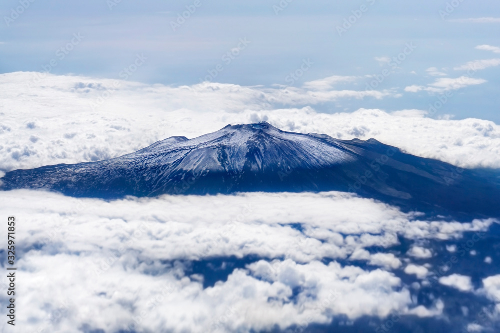 Etna mount covered in snow. Aerial view from above