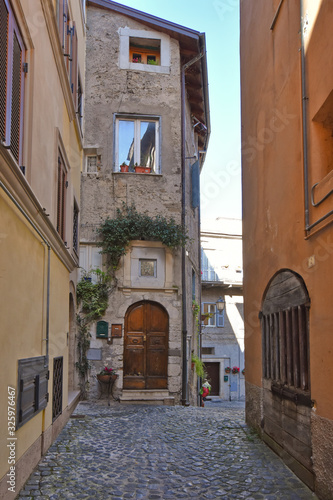 Anagni, Italy, A narrow street between the old stone houses of a medieval village. © Giambattista