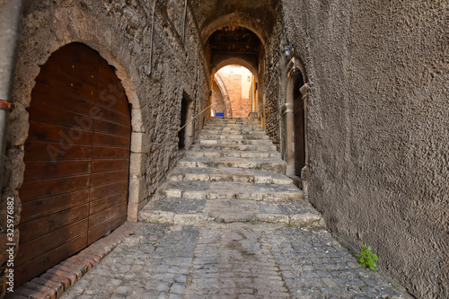 Anagni  Italy  A narrow street between the old stone houses of a medieval village.