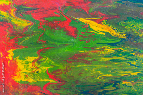 Liquid painting abstract texture. Colorful combination of bright colors.