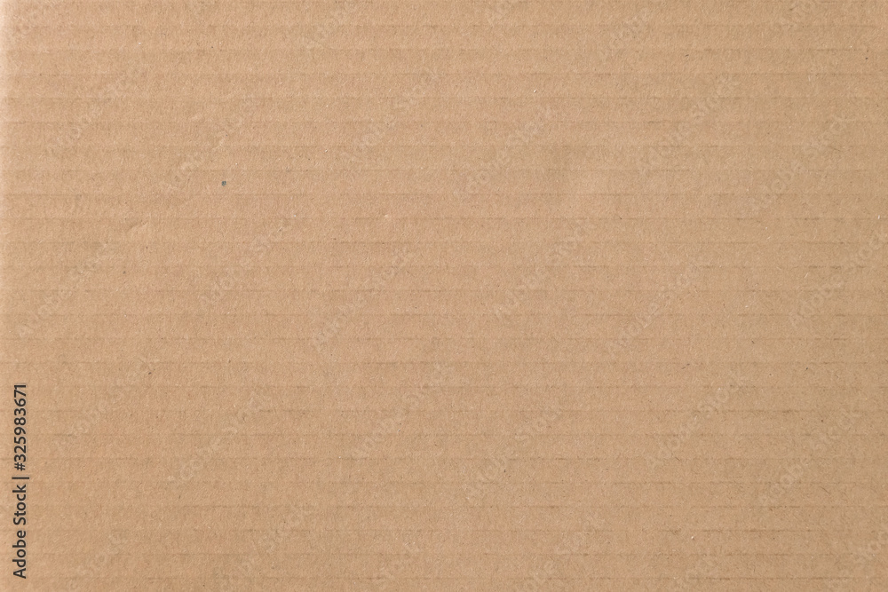 Brown cardboard sheet texture background. Texture of recycle paper box in old vintage pattern background.