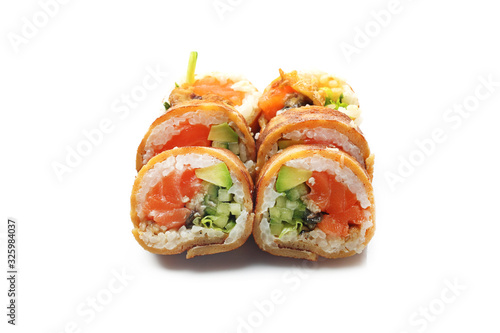 Sushi with salmon, cucumber and avocado wrapped in a tamago nigiri omelette. Sushi on a white background