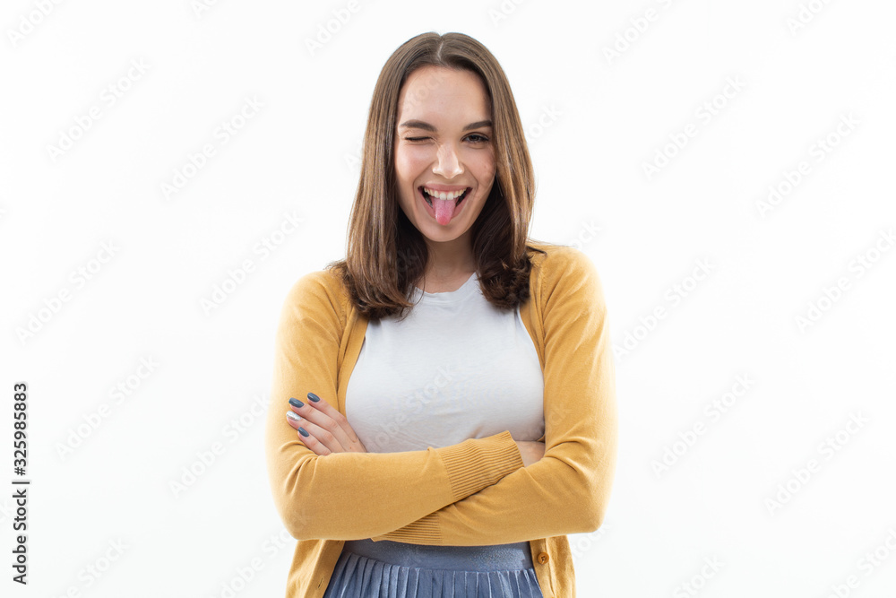 Portrait of a girl in a white t-shirt, yellow jacket and blue skirt on a white background Portrait of a girl in a white t-shirt, yellow jacket and blue skirt on a white background