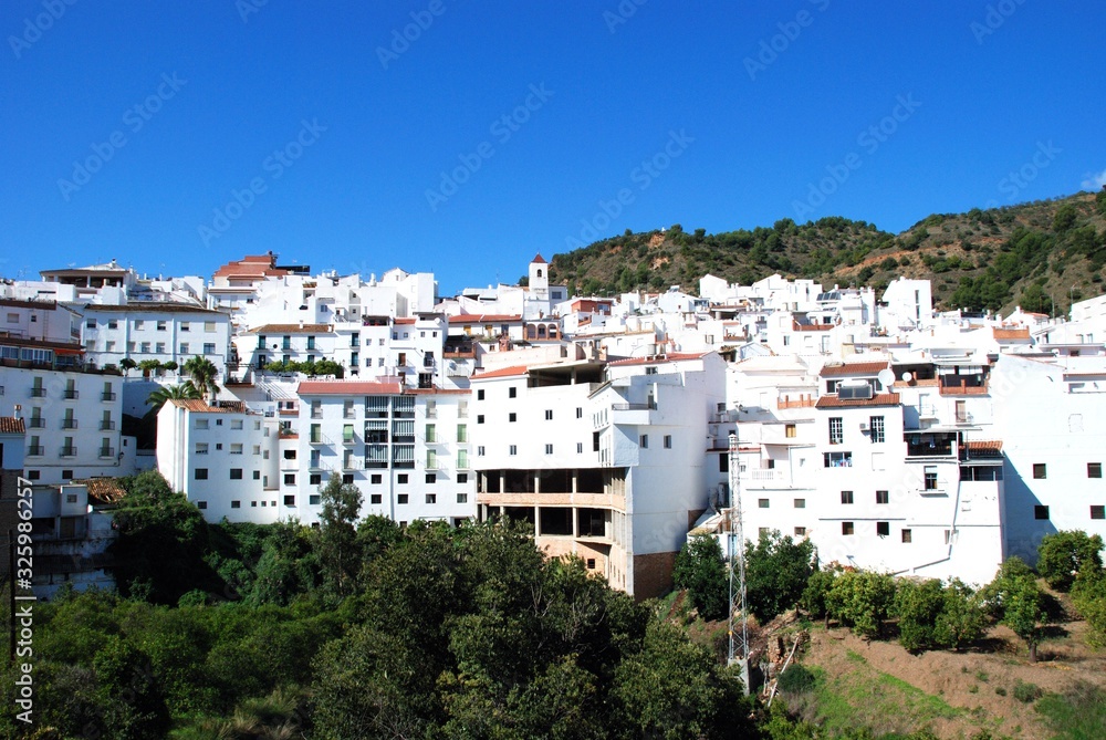 Town view showing the traditional whitewashed houses, Tolox, Spain.