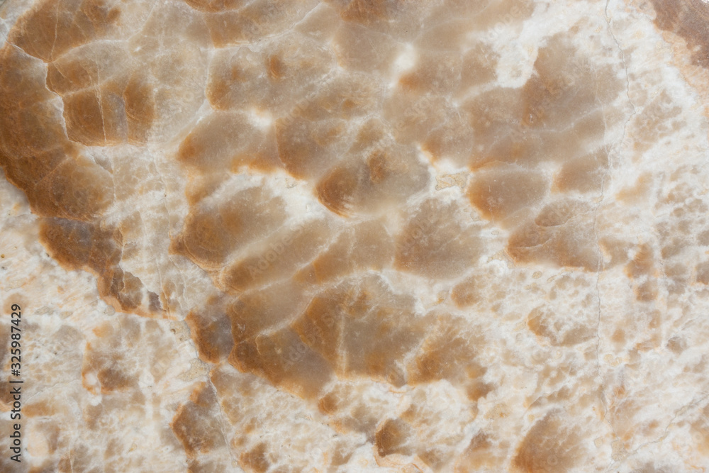 Natural white and brown marble texture background with luster and abstract patterns for making elegant and luxury wall tile patterns Natural white and brown marble texture background with luster and abstract patterns for making elegant and luxury wall tile patterns