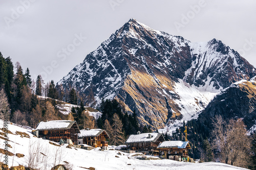 The traditional architecture of the Walser villages in the valleys of Monte Rosa, during a fantastic winter day, near the town of Alagna, Italy - February 2020. © Roberto