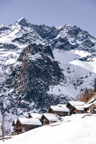 Photos The traditional architecture of the Walser villages in the valleys of Monte Rosa, during a fantastic winter day, near the town of Alagna, Italy - February 2020