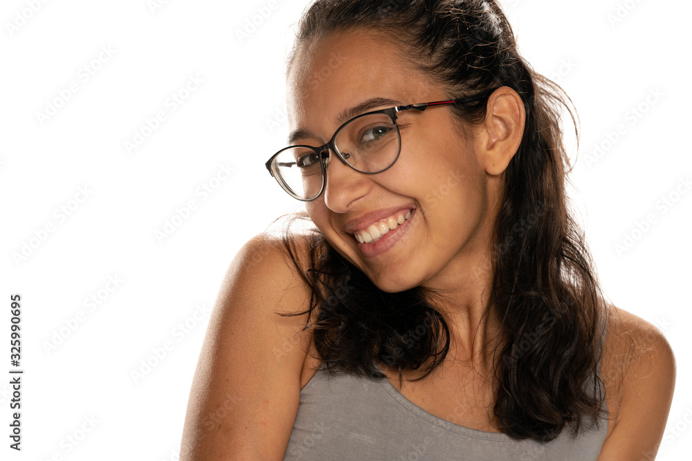 Happy young dark skinned woman with eyeglasses