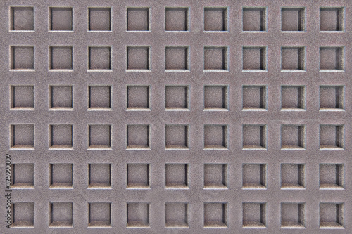Quadro em tela Metal surface with square holes and notches