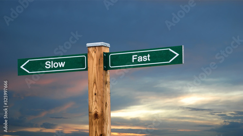 Street Sign to Fast versus Slow photo