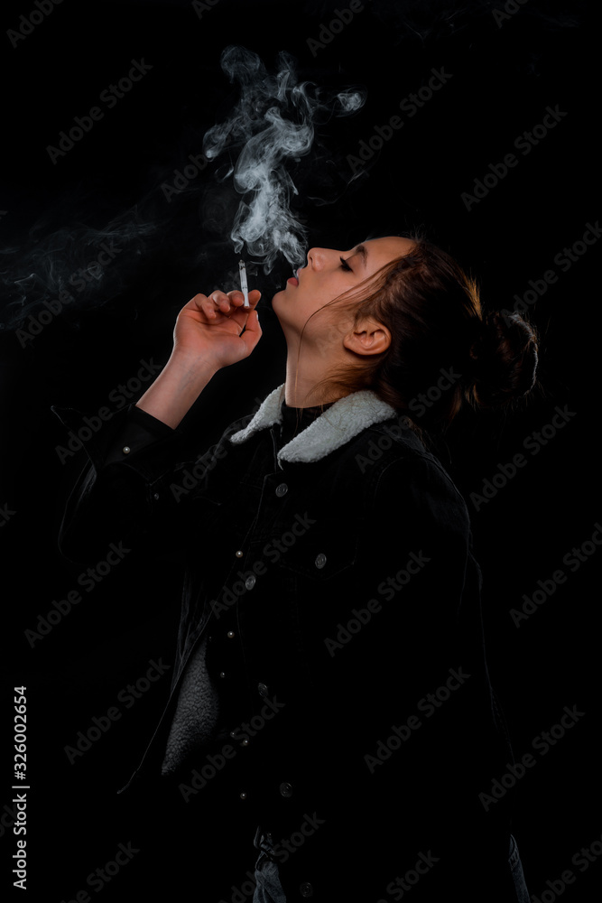 Attractive young model smoke cigarette