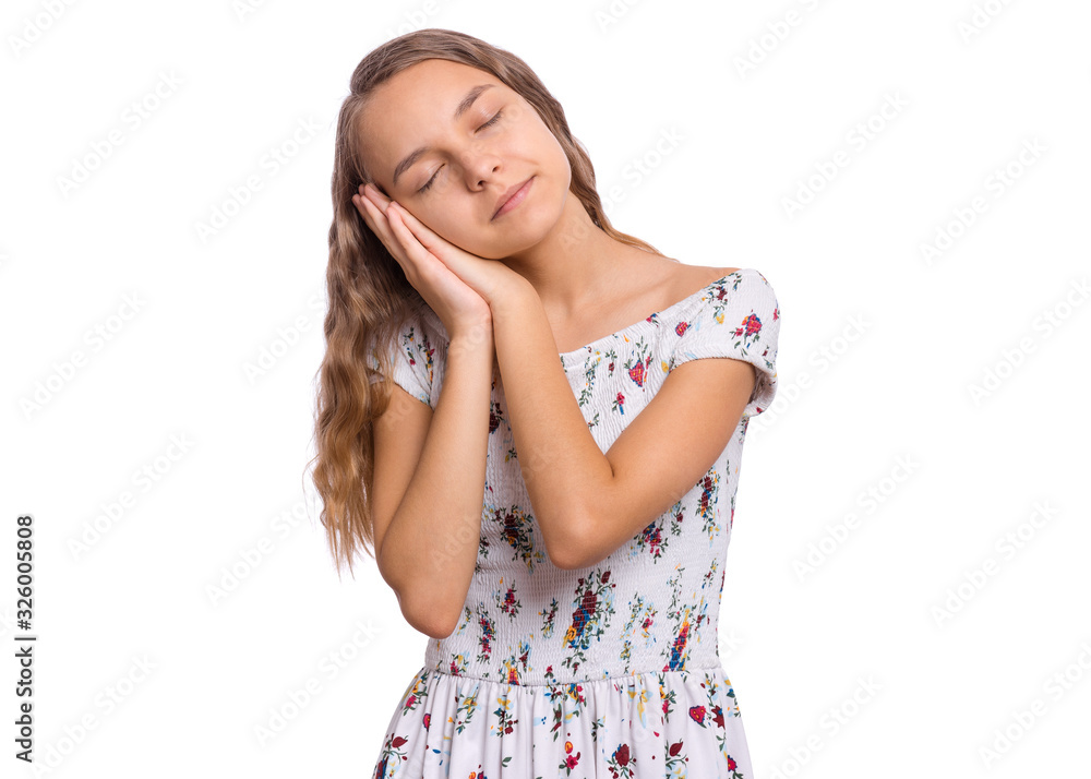 Portrait of teen boy sleeping tired or dreaming posing with hands together with closed eyes. Cute young caucasian teenager isolated on white background. Happy child. Portrait of teen boy sleeping tired or dreaming posing with hands together with closed eyes. Cute young caucasian teenager isolated on white background. Happy child.