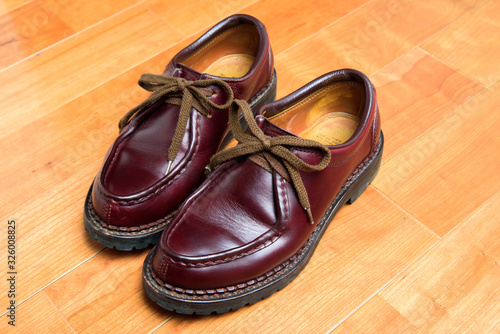 We maintained burgundy leather boots.