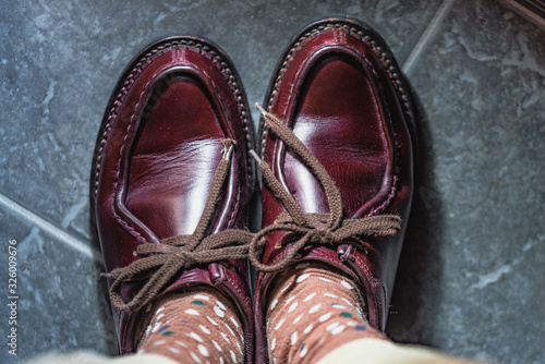 We maintained burgundy leather boots.