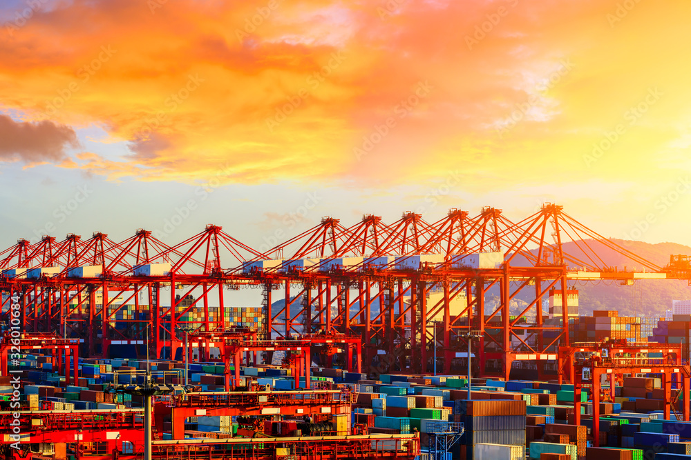 Industrial container freight port at beautiful sunset in Shanghai,China. Industrial container freight port at beautiful sunset in Shanghai,China.