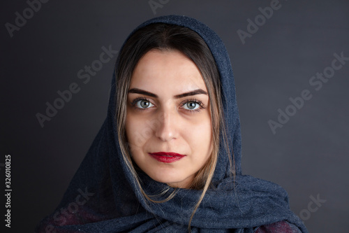 portrait of blue eyed middle eastern woman