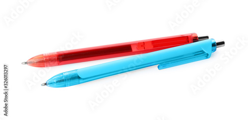 Foto Red and blue retractable pens isolated on white
