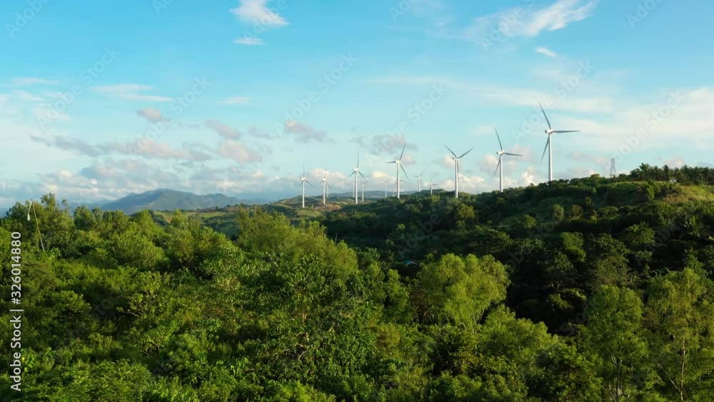 Wind turbines in the mountains. Wind mills for electric power production in the Philippines, Luzon. Wind turbines in the mountains. Wind mills for electric power production in the Philippines, Luzon.