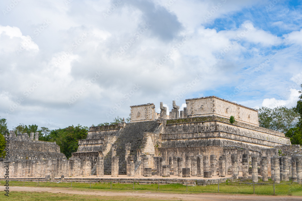 The Temple of the Warriors (Templo de los Guerreros) complex. Chichen Itza archaeological site. Architecture of ancient maya civilization. Travel photo or wallpaper. Yucatan. Mexico.