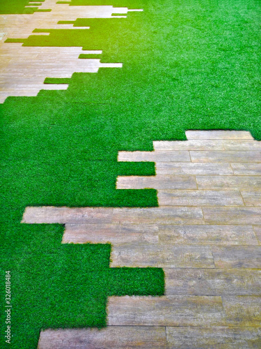 garden decoration with flooring artificial grass, backyard with decorative modern building,space for activity area