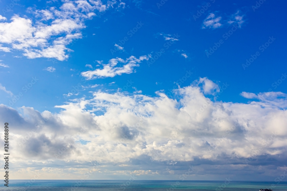 Natural landscape background, bright blue sky with white cumulus cloud