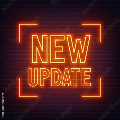 New update sign on brick wall background.