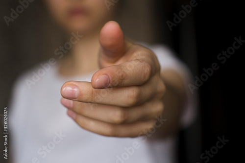 Fotografie young woman's hand reaching out
