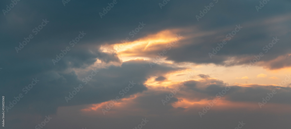 Beautiful bright sunset sky with clouds. Nature sky background. 
