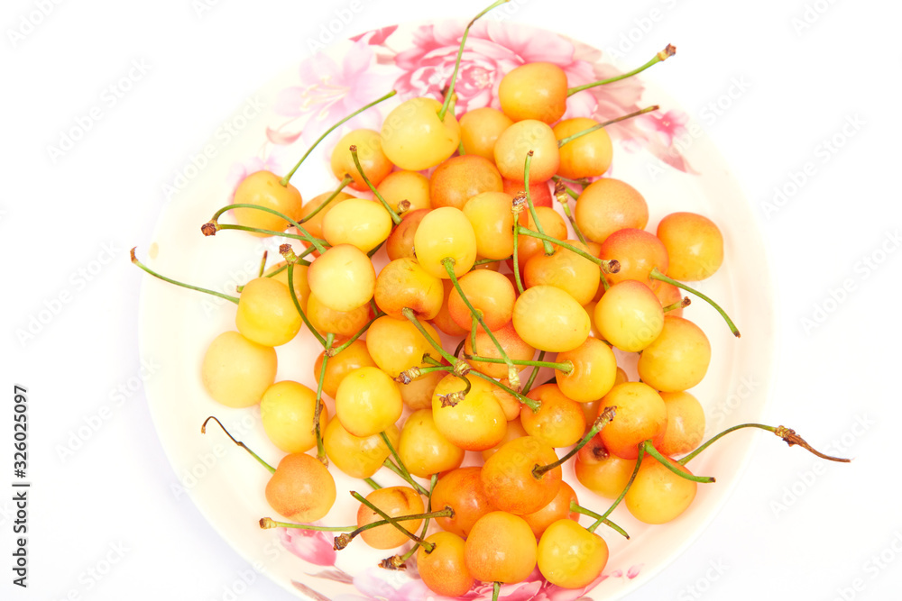 Fresh yellow cherries on the table